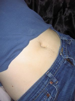 A mature woman posing in a transparent dress in front of a man. Thumb 6