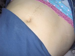 A mature woman posing in a transparent dress in front of a man. Thumb 8