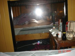 A blue-eyed minx with a pierced nipple plays with her panties. Thumb 10