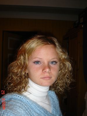 A blue-eyed minx with a pierced nipple plays with her panties. Thumb 40