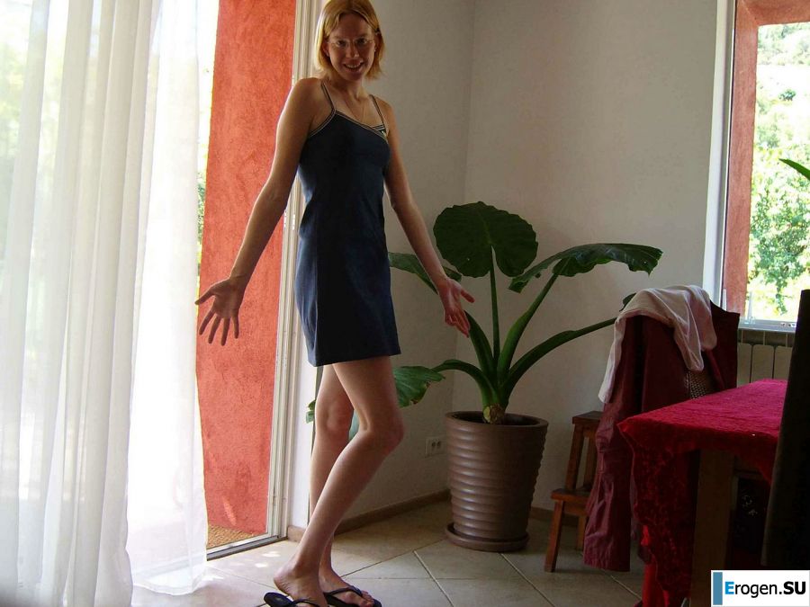 A tanned blonde with lingerie marks poses for a friend. Photo 5