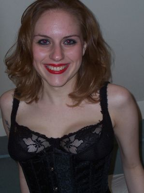 A fragile girl in a corset tied to a bed. Thumb 8