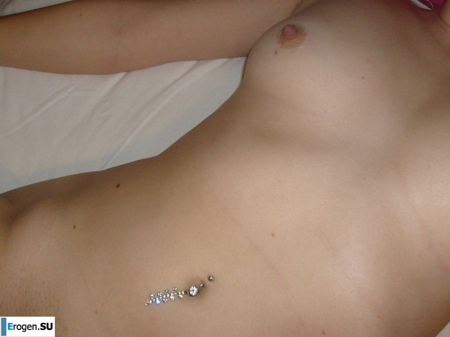 The blonde opened her labia and showed a wet vagina. Photo 27