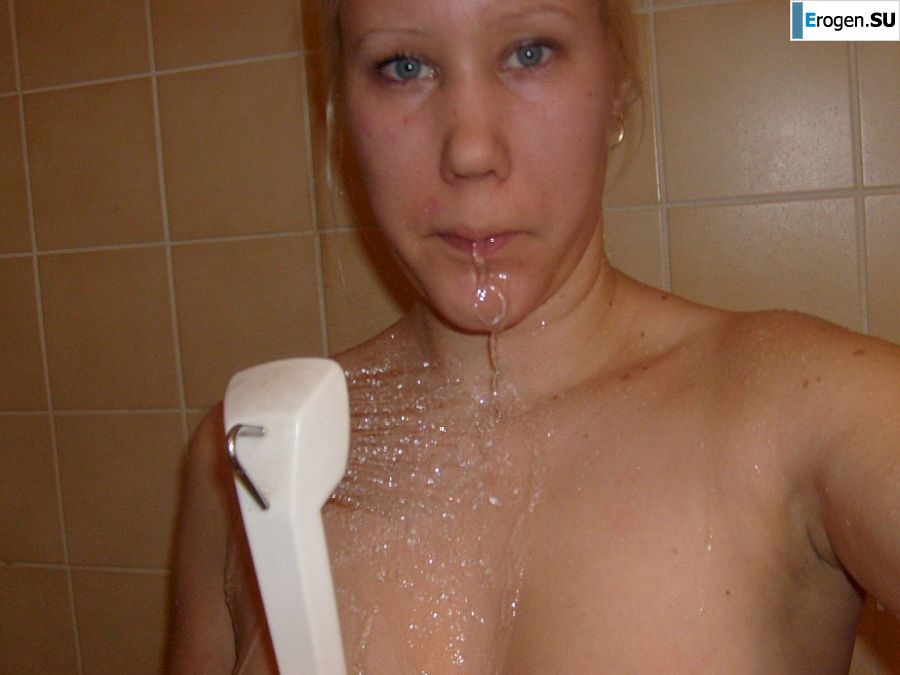 The blonde opened her labia and showed a wet vagina. Photo 3