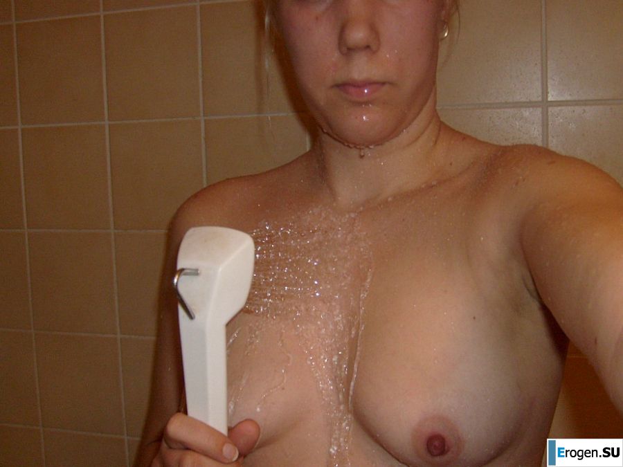 The blonde opened her labia and showed a wet vagina. Photo 4