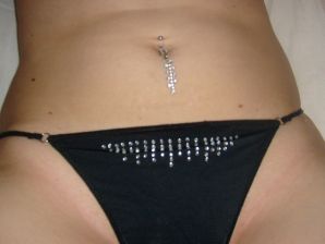 The blonde opened her labia and showed a wet vagina. Thumb 8