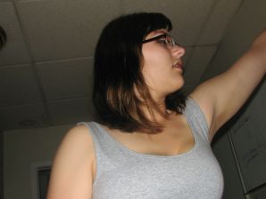 A girl with large breasts poses in clothes and then undresses. Part 2. Thumb 14