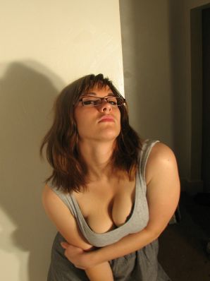 A girl with large breasts poses in clothes and then undresses. Part 2. Thumb 26