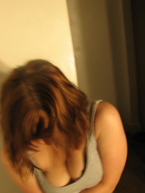 A girl with large breasts poses in clothes and then undresses. Part 2. Thumb 27