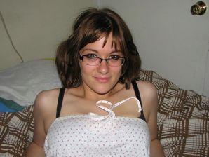 A girl with large breasts poses in clothes and then undresses. Part 2. Thumb 46