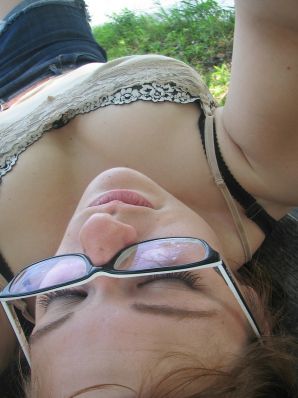 A girl with large breasts poses in clothes and then undresses. Part 2. Thumb 5