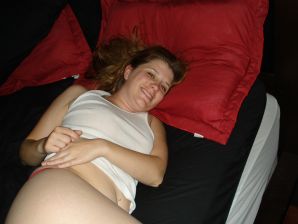 The seductive female is naked and shows a striptease, spreading her legs. Thumb 7