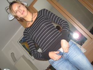 A slender beauty undresses and twists a booty in front of her man. Part 2. Thumb 9