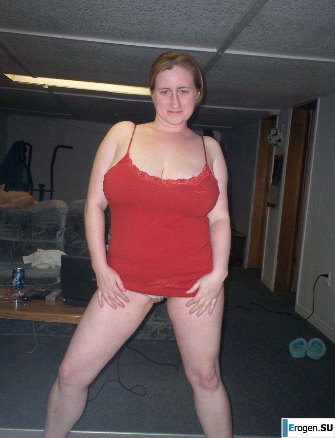 Busty woman posing in short dresses. Photo 12