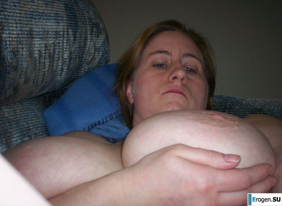 Busty woman posing in short dresses. Photo 13