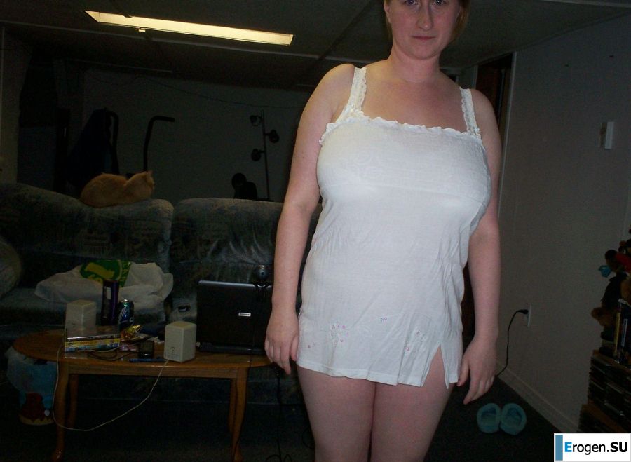 Busty woman posing in short dresses. Photo 18