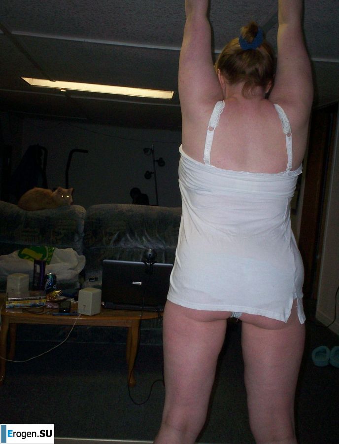 Busty woman posing in short dresses. Photo 20