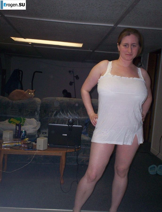 Busty woman posing in short dresses. Photo 21