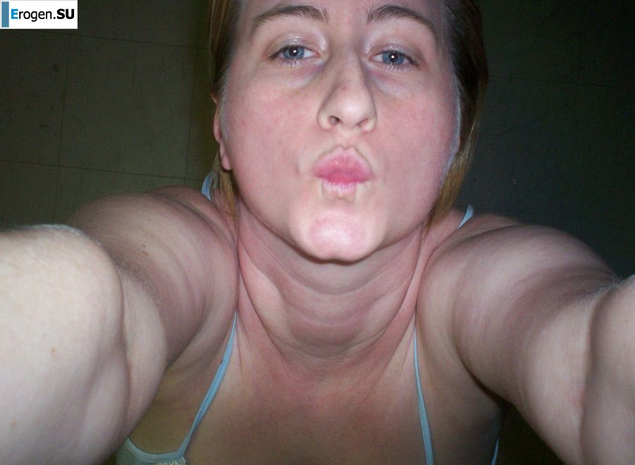 Busty woman posing in short dresses. Photo 26