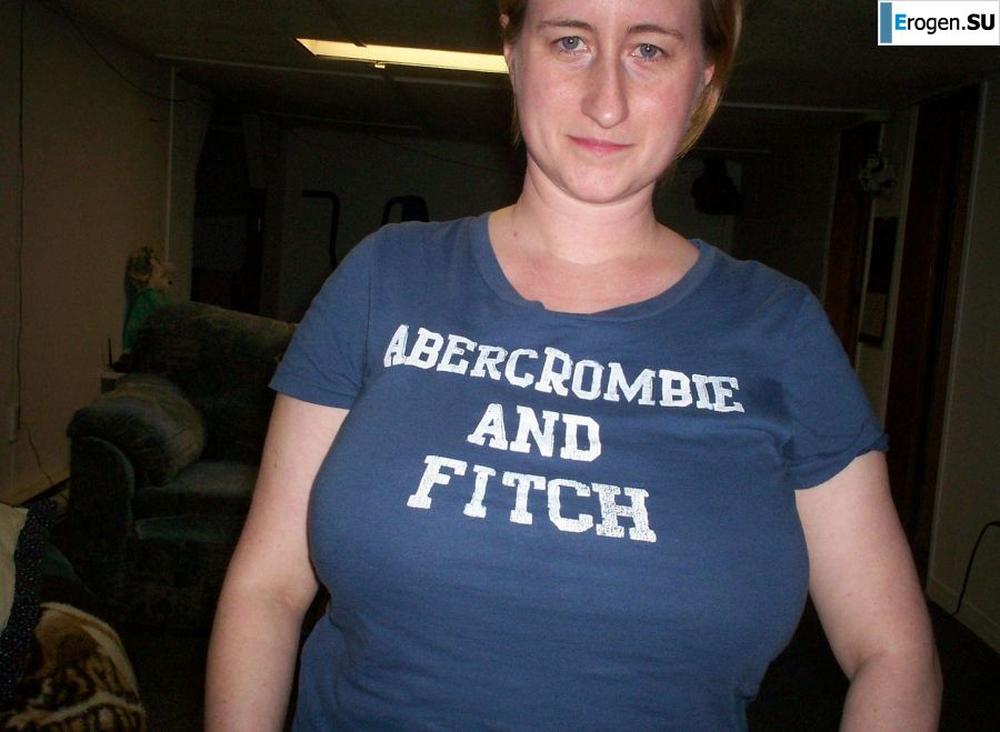 Busty woman posing in short dresses. Photo 27