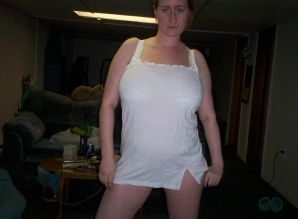 Busty woman posing in short dresses. Thumb 17