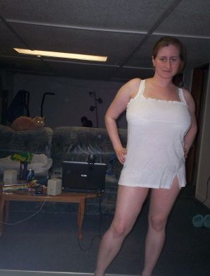 Busty woman posing in short dresses. Thumb 21