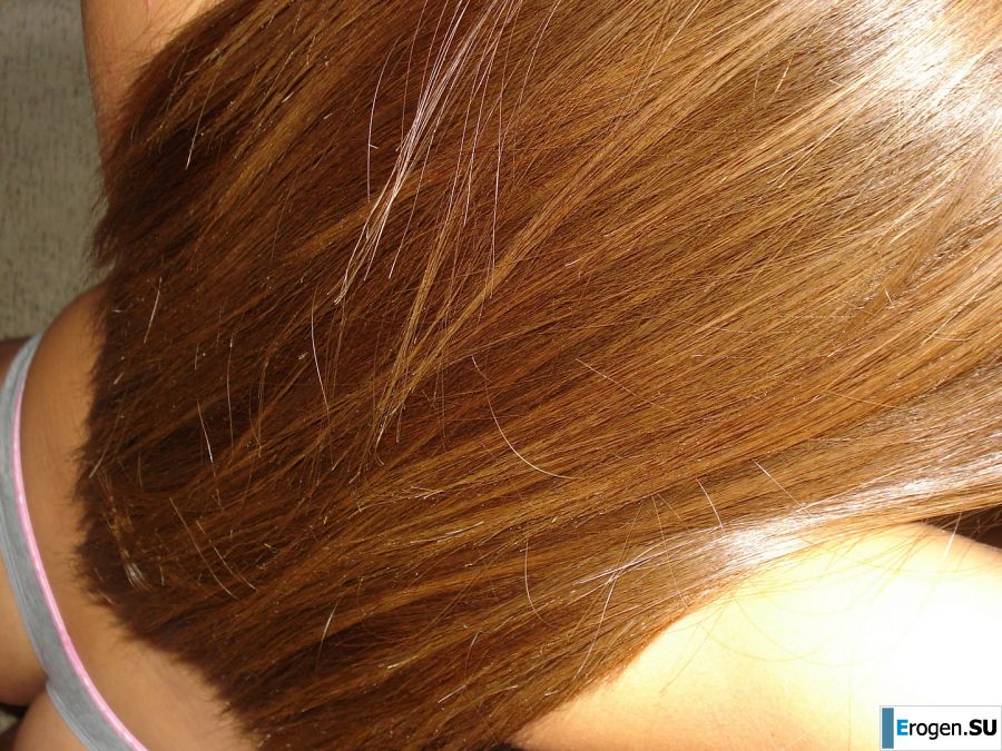 A woman with beautiful tits poses in a swimsuit and without him. Photo 4