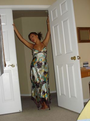 A woman with beautiful tits poses in a swimsuit and without him. Thumb 8