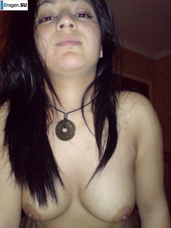 An Asian woman is lying on a bed in her underwear and showing off her ass. Photo 25