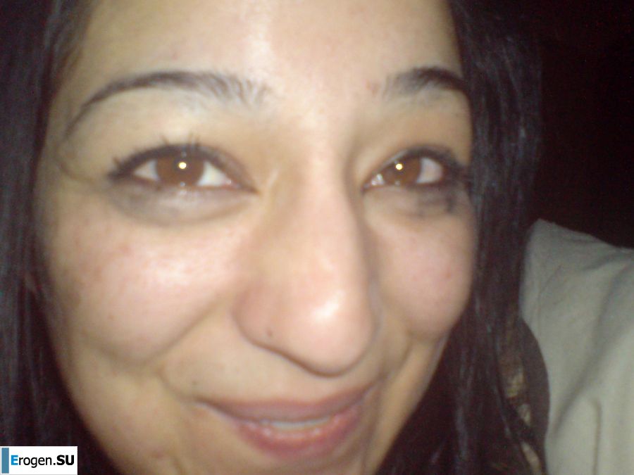 An Asian woman is lying on a bed in her underwear and showing off her ass. Photo 32