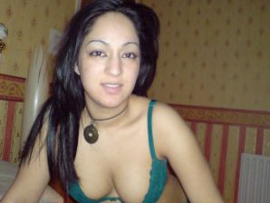 An Asian woman is lying on a bed in her underwear and showing off her ass. Thumb 12