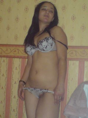 An Asian woman is lying on a bed in her underwear and showing off her ass. Thumb 29