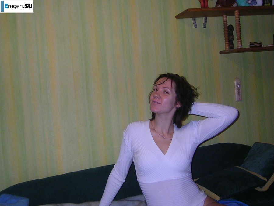 A naughty brunette with small breasts poses at the mirror. Photo 7