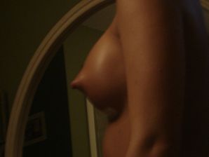 A pretty brunette drank in a bar and bared her breasts in front of a guy. Thumb 14