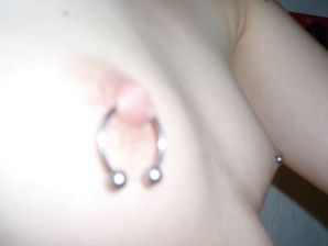 A student with a pierced nipple and tattoos undressed and showed a pussy. Thumb 13