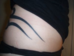 A student with a pierced nipple and tattoos undressed and showed a pussy. Thumb 17