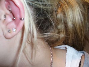 A student with a pierced nipple and tattoos undressed and showed a pussy. Thumb 34