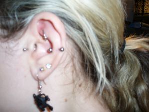 A student with a pierced nipple and tattoos undressed and showed a pussy. Thumb 5