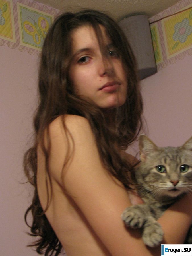 A pretty student is fingering a pussy and showing her labia. Photo 1