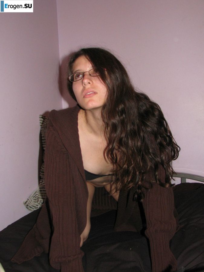 A pretty student is fingering a pussy and showing her labia. Photo 10