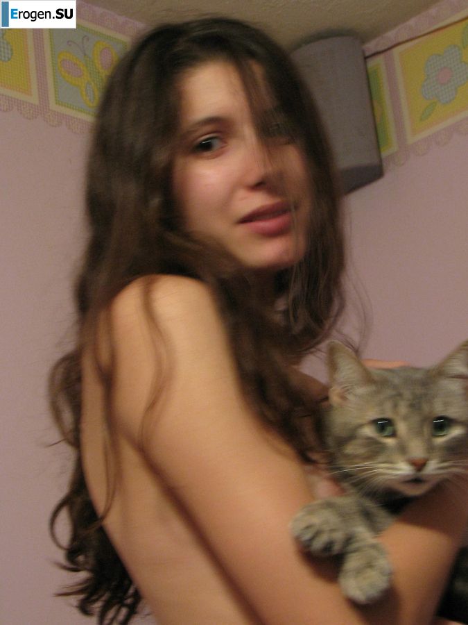 A pretty student is fingering a pussy and showing her labia. Photo 2