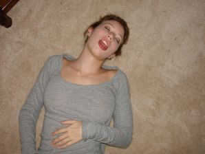 A young girl spread her legs and fingers her wet labia with her fingers. Thumb 10