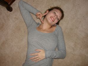 A young girl spread her legs and fingers her wet labia with her fingers. Thumb 11