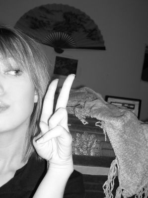 A young girl spread her legs and fingers her wet labia with her fingers. Thumb 3