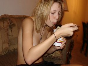 A young girl spread her legs and fingers her wet labia with her fingers. Thumb 30