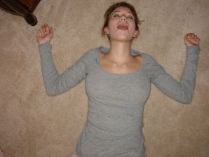 A young girl spread her legs and fingers her wet labia with her fingers. Thumb 7