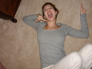 A young girl spread her legs and fingers her wet labia with her fingers. Thumb 9