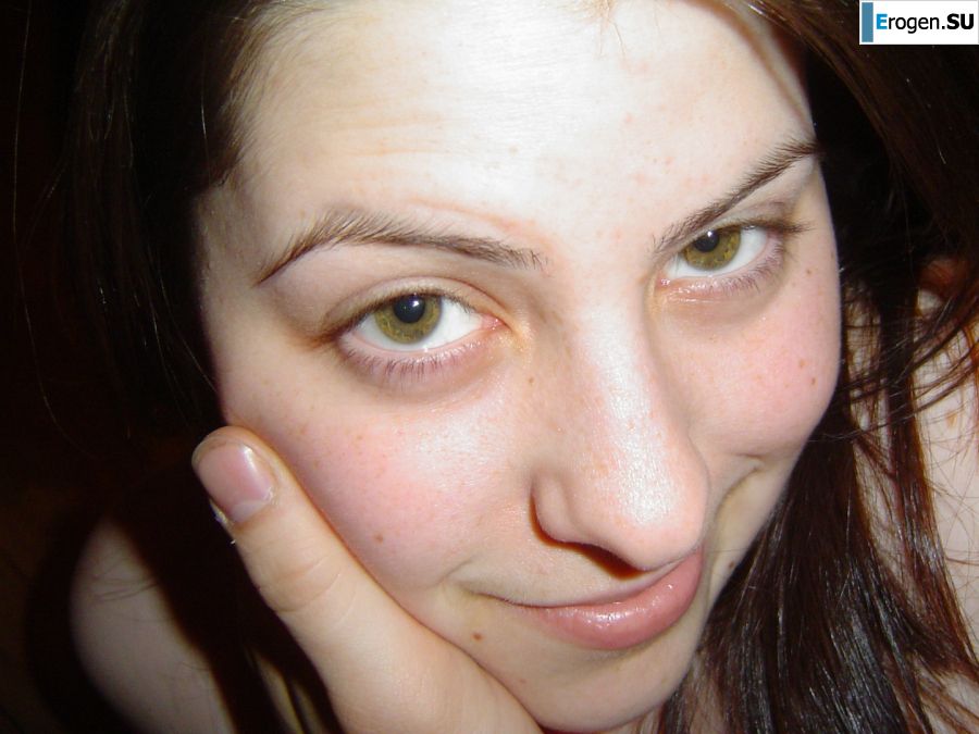 A naked girl shows her breasts, but is shy. Photo 16