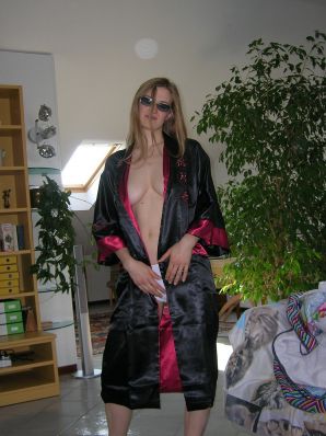 A tall blonde with wide hips undressed at home and showed tits. Part 2. Thumb 12