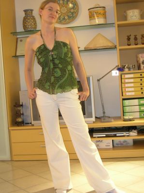 A tall blonde with wide hips undressed at home and showed tits. Part 2. Thumb 13